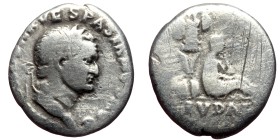 Vespasian (69-79). AR, Denarius. (Silver, 2.84 g. 16mm.) Rome.
Obv: IMP CAESAR VESPASIANVS AVG. Head of Vespasian, laureate, right.
Rev: IVDAEA. Jud...