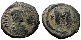 Justinian I (527 - 565) AE Follis (Bronze, 17.81g/33mm). Constantinopolis. 
Obv: DN IVSTINIANVS PP AVC, Draped and diademed bust of Justin I right, ar...