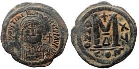Justinian I (527 - 565) AE, Follis. (Bronze, 21.67 g. 38 mm.) Constantinople. 527-565 AD
Obv: DN IVSTINIANVS PP AVG, helmeted, cuirassed bust facing h...