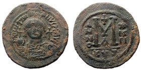 Justinian I (527 - 565) AE Follis. (Bronze, 23.17 g. 42mm.) Cyzicus. 527-565 AD
Obv: DN IVSTINIANVS PP AV[G]. Helmeted, cuirassed bust facing holding ...