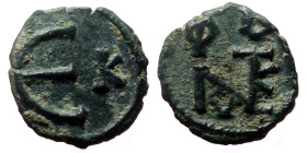 Justin II (565-578) AE, Pentanummium, (Bronze, 1.25 g. 12mm.) Constantinople. 565-578 AD.
Obv: Justin II monogram.
Rev: Large epsilon, officina letter...