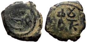 Justin II (565-578) AE Pentanummium (Bronze, 2.20g, 16mm) Constantinople
Obv: Monogram.
Rev: Large E with cross at center, A in right field.
Ref: S...