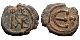 Justin II (565-578) AE Pentanummium (Bronze, 1.87g, 1,84mm) Nicomedia.
Obv: Monogram of Justin II.
Rev: Large Є; in field to right, N.
Ref: SB 371