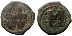 Justin II with Sophia (565-578) AE Follis (Bronze, 14,02g, 30mm) 565-578 AD. Antioch, year 8. 
Obv: blundered legend with Justin left, Sophia right ni...