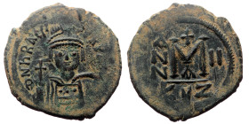 Heraclius, AE, Follis. (Bronze, 12.17 g. 32mm.) Constantinople. 610-641 AD.
Obv: D N hRACLI [PERP AVG]. Draped and cuirassed bust of Heraclius facing,...