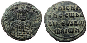 Nicephorus II Phocas. AE, Follis. (Bronze, 6.99 g. 26mm.) Constantinople. 963-969 AD.
Obv: NICIFR bASILEV RW[M], crowned bust facing with short beard,...