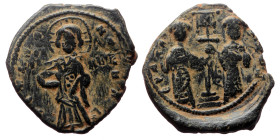 Constantine X Ducas and Eudocia AE, Follis (Bronze, 10.36 g. 32mm.) Constantinople. 1059-1067 AD. Overstruck.
Obv: [+ EMMA] NOVHA, Christ standing fac...