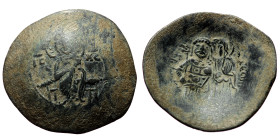 Manuel I Comnenus. AE, Trachy (Bronze, 4.45 g. 30mm.) Constantinople. 1143-1180 AD.
Obv: IC-XC, Christ nimbate, wearing tunic and kolobion, seated upo...