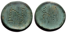AE Eastern Mediterranean/Aegean. One-nomisma Weight. (6th–7th centuries AD).
Discoid in form with plain profile; punched on the top and botom with th...