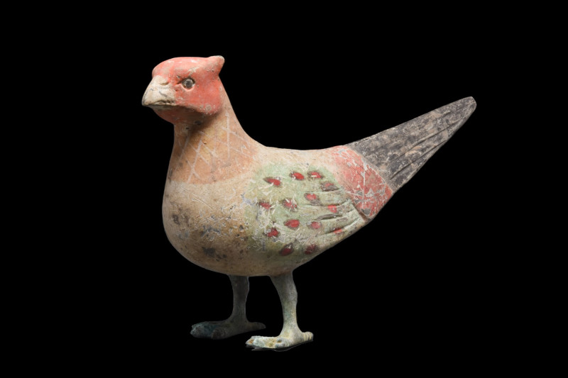 CHINESE HAN DYNASTY POLYCHROME BIRD
Ca. 202 BC - 220 AD. 
A polychrome terraco...
