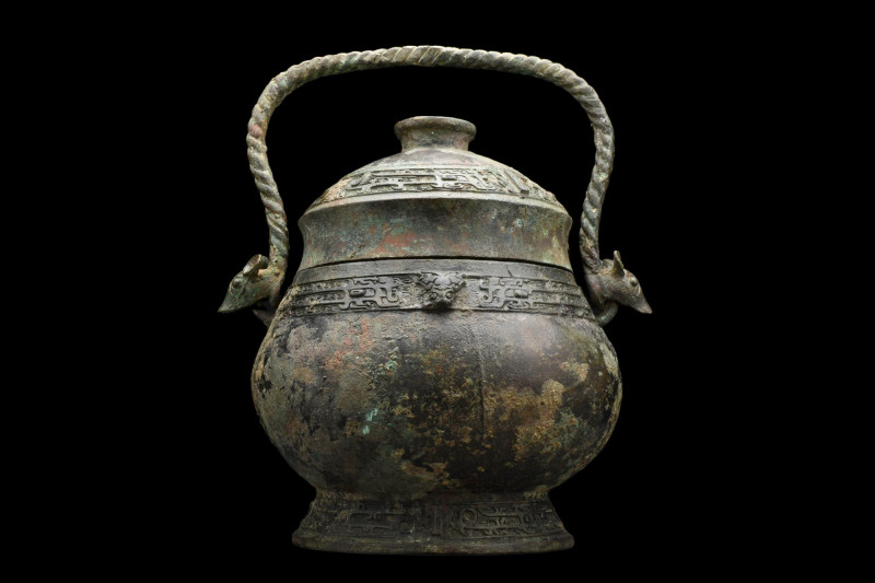 BRONZE RITUAL WINE VESSEL AND COVER (YOU)
Late Shang-Early Western Zhou dynasty...