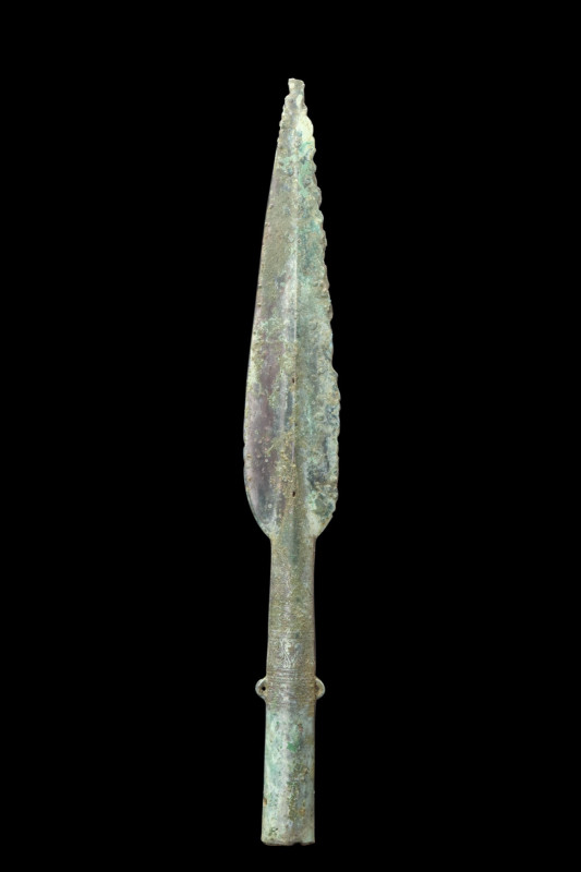 CHINESE WARRING STATES BRONZE DECORATED SPEAR
Ca. 1200-800 BC. 
A beautifully ...