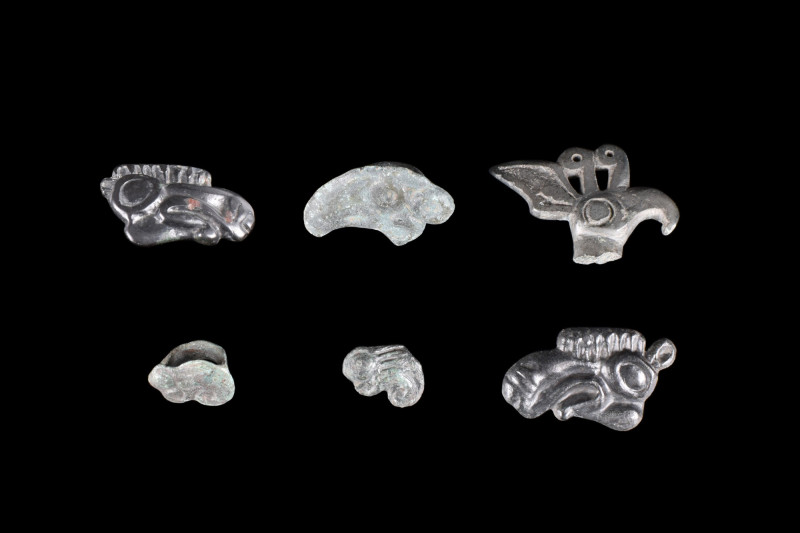 COLLECTION OF SIX SCYTHIAN BRONZE ZOOMORPHIC FITTINGS
Ca. 500-300 BC. 
Six fla...