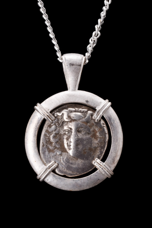 LARISSA SILVER DRACHM IN SILVER PENDANT

Thessaly, ca. 400-370 BC. 
A silver ...