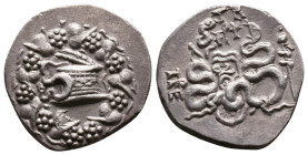 MYSIA, PERGAMUM AR CISTOPHORUS

Ca. 133-67 BC. 
Mysia, Pergamum Ar. cistophorus, ca. 133-67 BC. Cista mystica, half-opened with a serpent emerging ...
