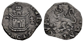 Felipe II (1556-1598). 1/2 cuarto. Cuenca. (Cal-68). (Jarabo-Sanahuja-A89). Ae. 0,59 g. Castillo entre C y cruz patriarcal, delante del león cuenco su...
