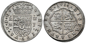 Felipe V (1700-1746). 2 reales. 1718. Segovia. J. (Cal-945). Ag. 6,51 g. Acueducto de 2 arcos y 1 piso. Raya en reverso. Restos de brillo original. EB...