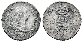 Carlos III (1759-1788). 1/2 real. 1722. Madrid. PJ. (Cal-157). Ag. 1,38 g. Primer año de busto. Limpiada. MBC/MBC-. Est...35,00.