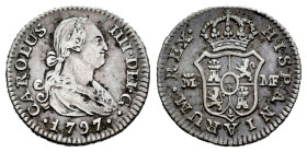Carlos IV (1788-1808). 1/2 real. 1797. Madrid. MF. (Cal-259). Ag. 1,42 g. Limpiada. MBC-/MBC. Est...35,00.