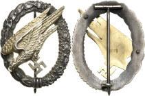 Orden des Dritten Reiches
Fallschirmschützenabzeichen Verliehen 1936-1945. Buntmetall, vergoldet, versilbert. Hersteller "JMMK" 51,5 x 40,5 mm, 30,98...