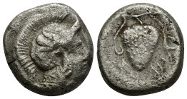 CILICIA, Soloi. Circa 390-375 BC. AR Stater (8.8Gr. 25mm.) 
Helmeted head of Athena right, helmet decorated with griffin 
Rev. Grape cluster diagonall...
