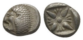 IONIA, Miletos. 600-550 BC. AR Obol (9mm, 1.2 g). Forepart of roaring lion, head turned back / Starlike floral design within square incuse.