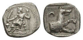 Lycaonia. Laranda circa 400-300 BC. Obol AR (10mm, 0.9 g). Baaltars seated left on throne, holding grain ear and grapes in his right and sceptre in hi...