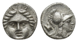 Pisidia, Selge AR Obol. (9mm, 1.1 g) Circa 3rd Century BC. Gorgoneion / Helmeted head of Athena left; astragalos before.