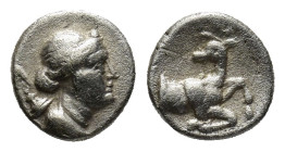 Ionia, Ephesos AR Trihemiobol. Circa 340-325 BC. (0.6 Gr. 12mm.)
Draped bust of Artemis right, quiver at shoulder 
Rev. Stag kneeling right, head reve...