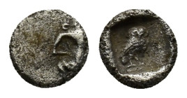 Cilicia. Uncertain mint circa 400-300 BC. Tetartemorion AR (5mm, 0.3 g). Persian king or hero in kneeling-running stance right, holding dagger and bow...