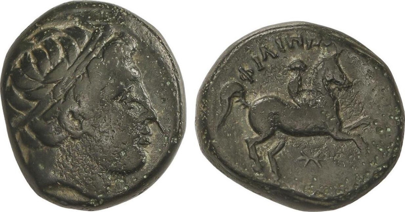 AE 16. 359-336 a.C. FILIPO II. MACEDONIA. Anv.: Cabeza de Apolo a derecha. Rev.:...