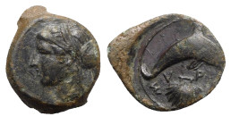 Sicily, Syracuse, c. 415-405 BC. Æ Hemilitron (18mm, 3.72g, 3h). Head of Arethusa l., hair bound in ampyx and sphendone; two leaves to r. R/ Dolphin s...