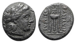 Kings of Macedon. Kassander (319-297 BC). Æ (19mm, 6.00g, 11h). Pella or Amphipolis, 306-297. Laureate head of Apollo r. R/ Tripod; monogram to r. HGC...