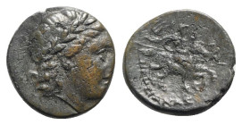 Ionia, Kolophon, c. 330-285 BC. Æ (18mm, 5.03g, 11h). Hegesianax, magistrate. Laureate head of Apollo r. R/ Horseman, holding spear pointed forwards a...