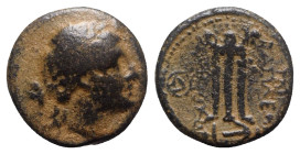 Seleukid Kings, Antiochos II (261-246 BC). Æ (18mm, 5.90g, 1h). Antioch. Laureate head of Apollo r. R/ Tripod; monograms to outer l. and r., anchor be...