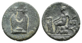 TROAS. Abydos 120-50 BC. 
Obv: Lyre. 
Rev: ABY.
Apollo sitting left on rock, extending right hand towards a large eagle standing right with wings clos...
