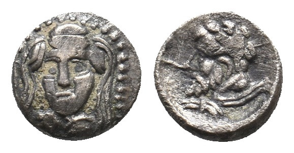 CILICIA. Uncertain. (Tarsos or Nagidos) (4th century BC). AR Obol.
Obv: Head of...