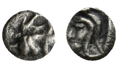 ASIA MINOR, Uncertain. (6th-5th century BC) AR Tetartemorion. .
Obv: Head of griffin right.
Rev: Bearded head of Satrap (?) left.
No reference. (No...