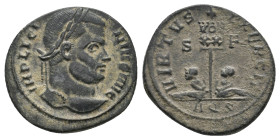 LICINIUS I (308-324). Follis. Aquileia.
Obv: IMP LICINIVS AVG
Laureate head of Licinius I to right.
Rev: VIRTVS - EXERCIT / S - F / AQS
Vexillum i...