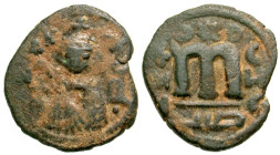 "Umayyad Caliphate, Umayyad Copper Coinage. temp. 'Abd al-Malik. AH 65-86/ AD 685-705. AE fals (20.6 mm, 3.44 g, 6 h). Hims (Emesa) mint, struck ca. A...