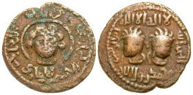 "Artuqids of Mardin. Najm al-Din Alpi. AH 547-572/ AD 1152-1176. AE dirhem (29.7 mm, 11.09 g, 7 h). In the name of caliph al-Mustanjid (AD 1160-1170)....