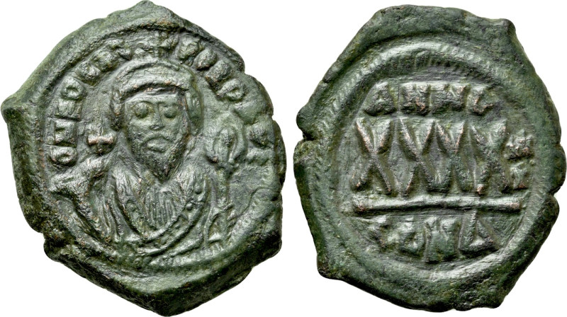 PHOCAS (602-610). Follis. Constantinople. Dated RY 3 (604/5). 

Obv: D N FOCAS...