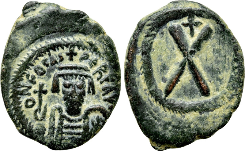 PHOCAS (602-610). Decanummium. Constantinople. 

Obv: ON FOCAS PЄRP AVG. 
Cro...