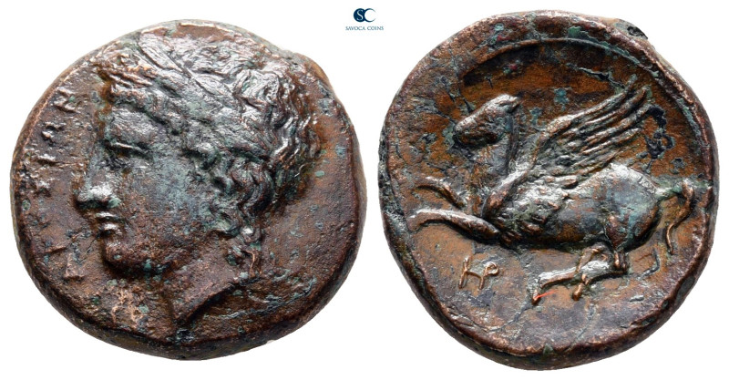 Sicily. Syracuse circa 344-317 BC. 
Bronze Æ

18 mm, 4,70 g

Laureate head ...