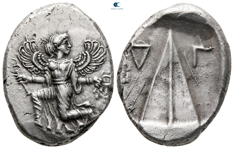 Caria. Kaunos circa 450-430 BC. 
Stater AR

27 mm, 11,64 g

Winged female f...