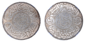 Saudi Arabia, Hejaz AH1334//9, 20P(1 Riyal).

Graded MS 61 by NGC. Only 11 coins graded higher at NGC. Struck with good dies; decent surfaces; very li...