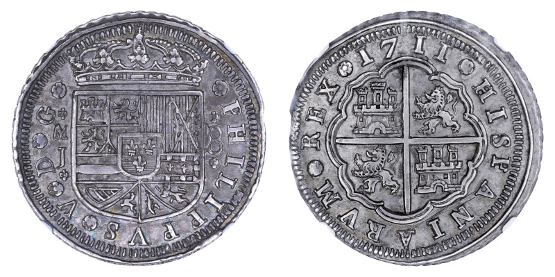 Spain 1711M J, 8 Reales.

Graded AU Details by NGC. Well struck with sharp detai...