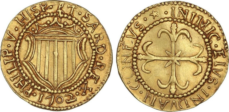 Spanish Monarchy
Escudo de Oro. 1702. CAGLIARI. 3,20 grs. (Leves rayitas). RARA...