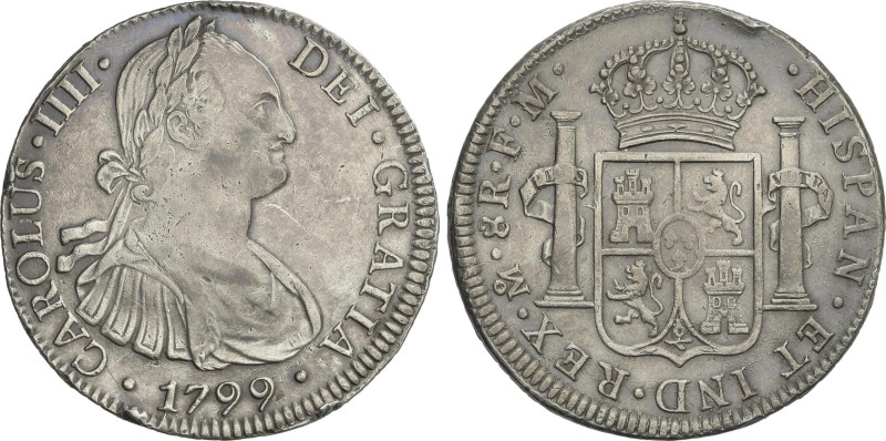 Spanish Monarchy
8 Reales. 1799. MÉXICO. F.M. 26,77 grs. Golpecito en canto. AC...