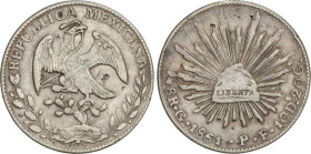World Coins
8 Reales. 1861/51. GUANAJUATO. P.F. 27,12 grs. AR. Correción de fecha visible en la parte superior derecha del 6. Pequeñas contramarcas. ...